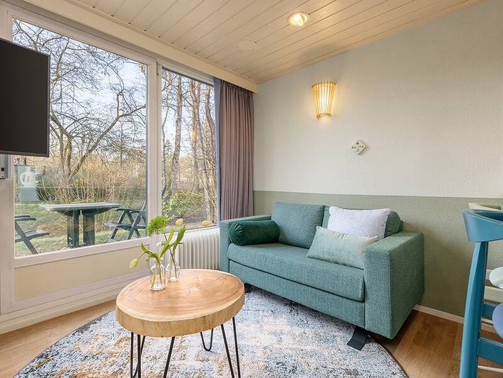 Lodge voor 2 personen, with zwembad and terras as well as tuin in Noord-Brabant