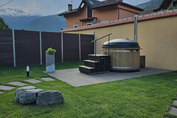 Gîte pour 6 personnes, avec jacuzzi et jardin ainsi que sauna et balcon à Suse