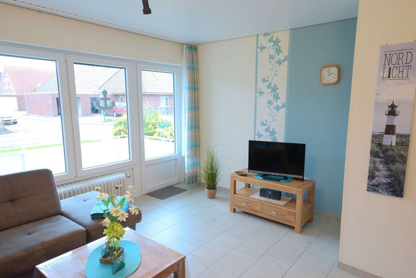 Apartamento entero, Strandnahe und gemütliche Parterre-Ferienwohnung mit Terrasse in Strand Norddeich, Norddeich