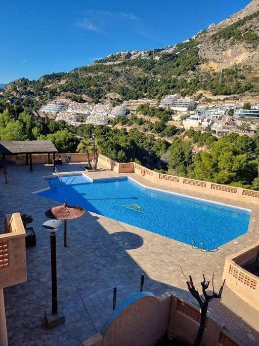 Appartement de vacances pour 4 personnes, avec jardin ainsi que piscine et vue, animaux acceptés
