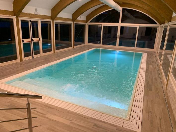 Appartamento per 6 persone, con Terrazza e Giardino nonché Piscina e Sauna in Cimone