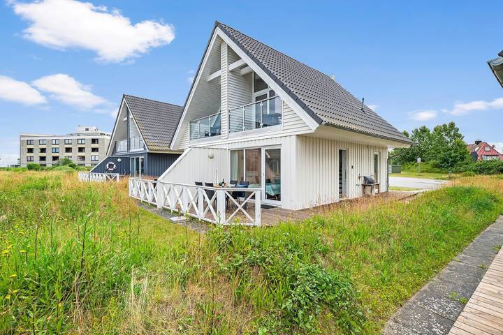 Ferienhaus für 4 Personen, mit Balkon und Terrasse sowie Garten und Sauna