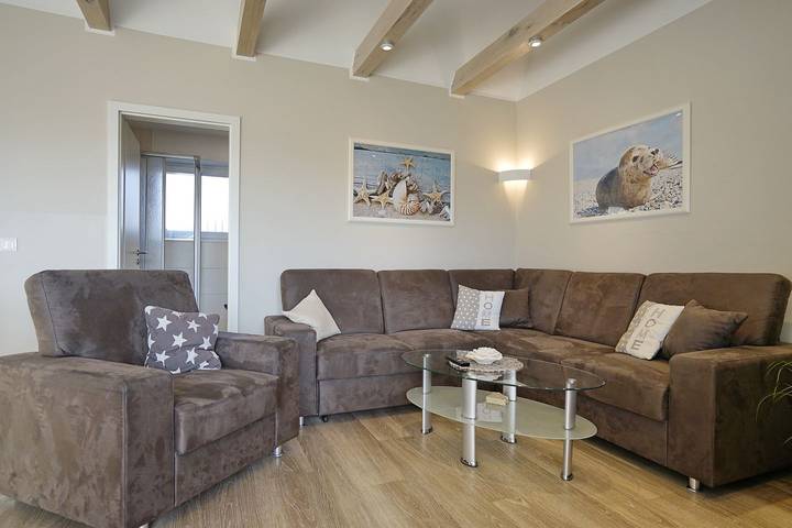 Ganze Wohnung, Ferienwohnung Deichperle mit hochwertiger Ausstattung direkt an der Perlebucht in Hundestrand Büsum, Büsum