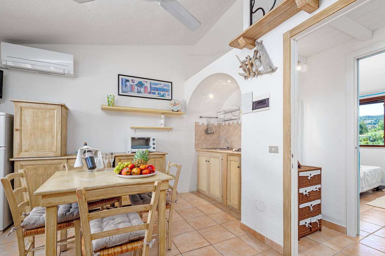 Ganze Wohnung, Ferienwohnung 'Blue House Laconia' mit Meerblick, Balkon und Klimaanlage in La Conia, Arzachena