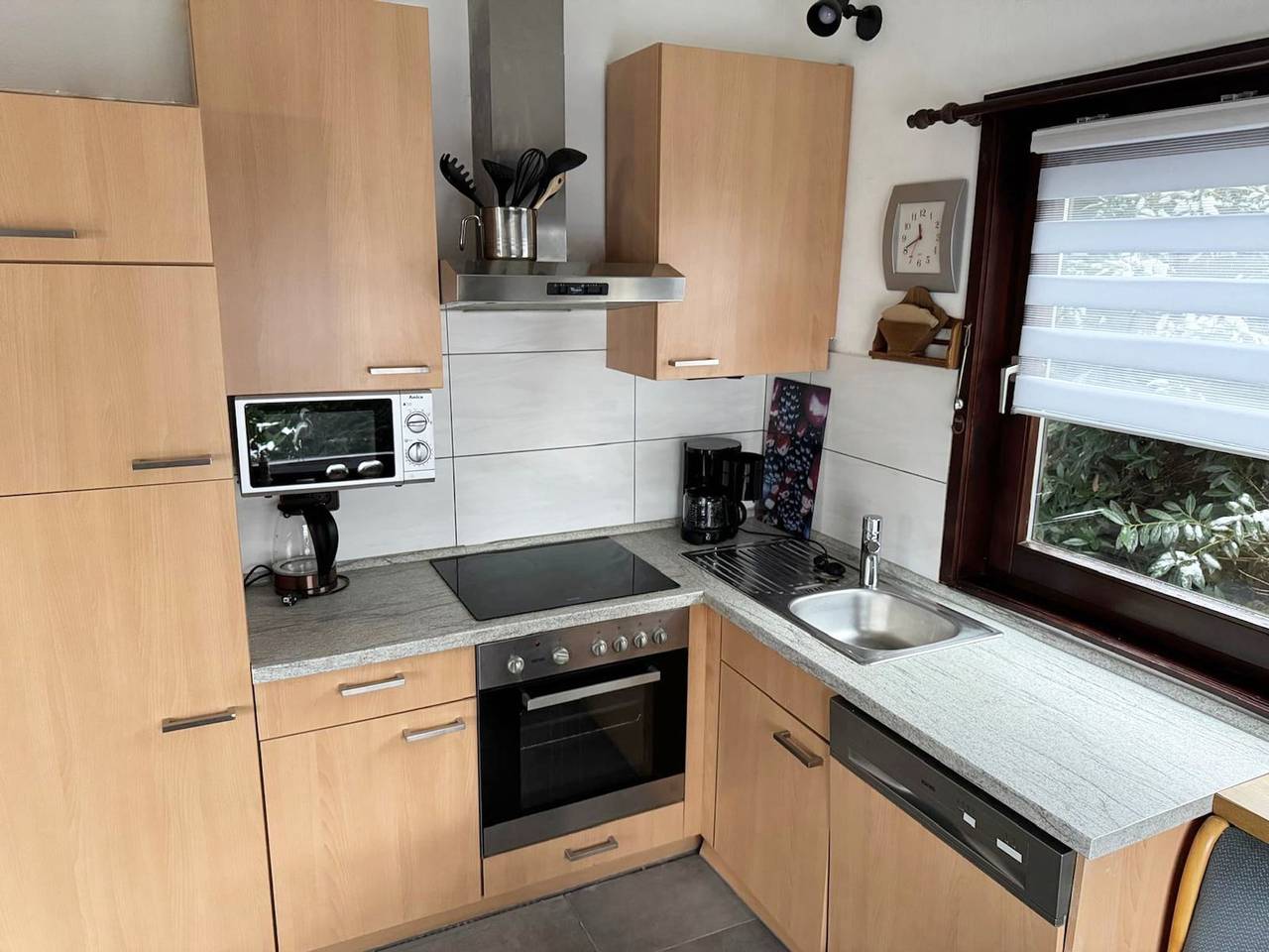 Cozy holiday home on lake Henne with terrace and beach chair in Meschede, Hochsauerlandkreis