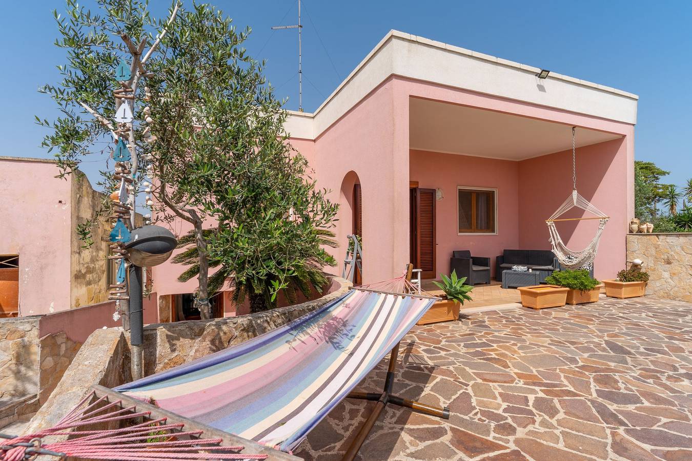 Appartamento intero, Appartamento vacanze Amare 1 vicino alla spiaggia con terrazza coperta e giardino in Melendugno, Provincia di Lecce