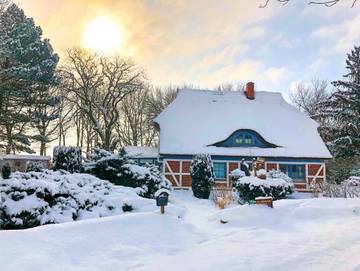 Ferienwohnung für 9 Personen, mit Terrasse und Ausblick sowie Garten, mit Haustier in Ummanz