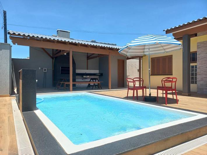 Casas e apartamentos de temporada para 16 pessoas, com jardim e vista e ainda piscina em Arroio do Sal