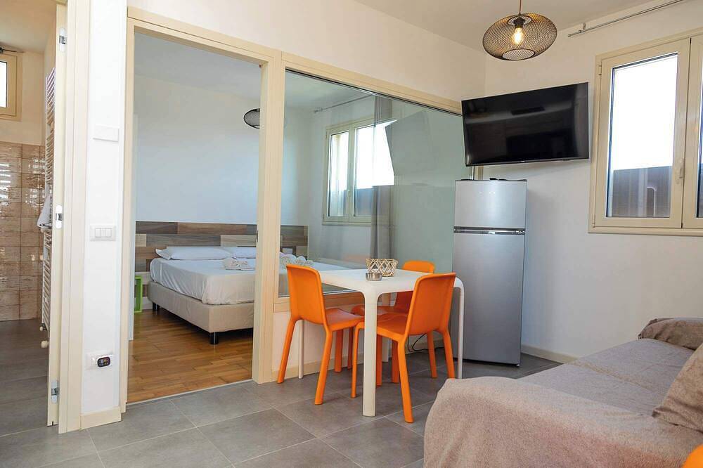 Ganze Wohnung, Boomerang Home 7 – Suite nel Boomerang Village Resort 4 Stelle – a pochi minuti dalla Spiaggia di San Pietro in Bevagna in Manduria, Golf von Tarent