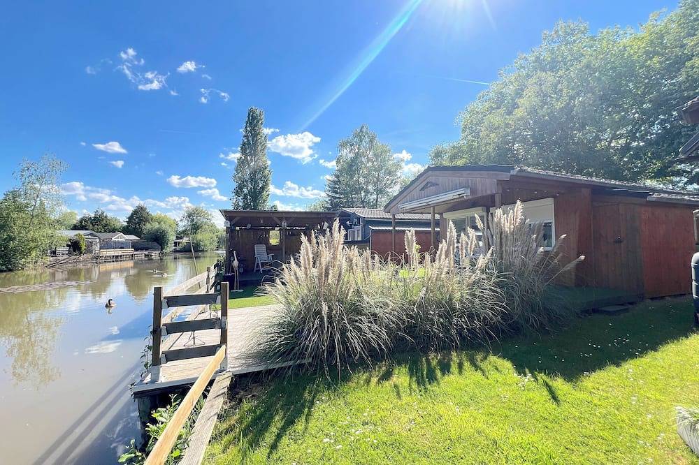 Gezellig vakantiehuisje aan het water in Geel, Antwerpen en omgeving