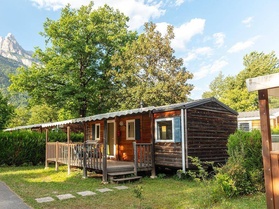 Flower Camping Les Iles - Mobilheim 4 personen - Standard 27m² (2Sch-4Pers) + Tv + Terrasse - 7N in Passy, Pays du Mont-Blanc