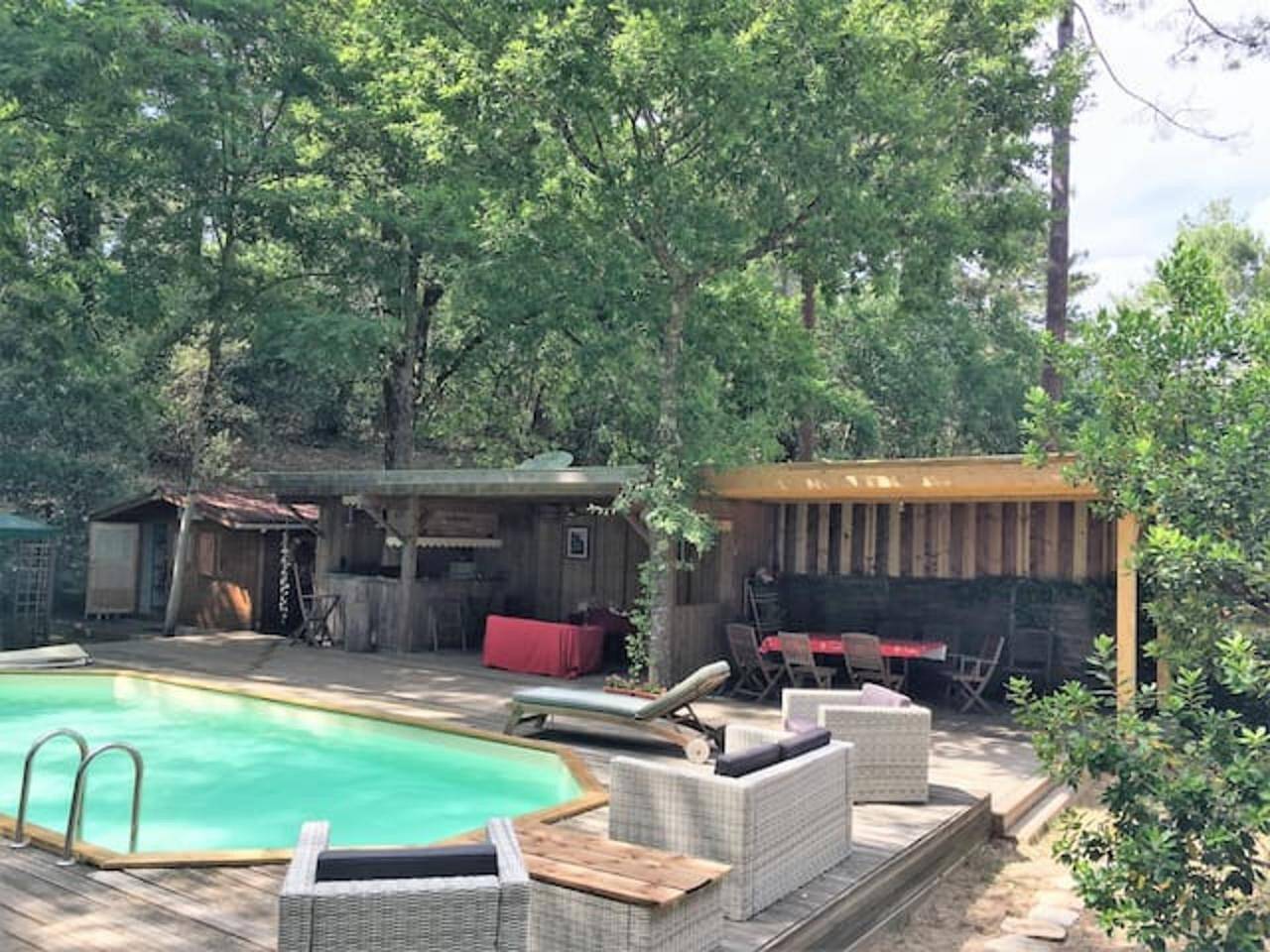 Chalet 'Cap Ferret Villa Grand Bois' avec piscine privée, terrasse privée et jardin privé in Petit Piquey, Lège-Cap-Ferret