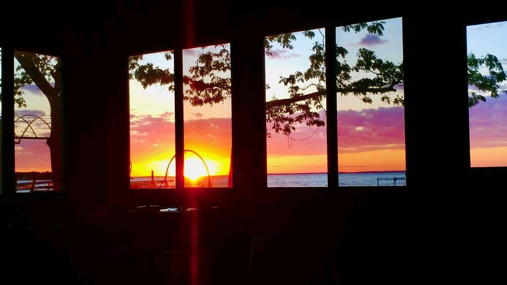 Waterfront house with sandy beach near downtown in Prudenville, Roscommon County