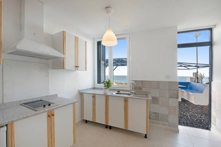 Apartamento entero, Apartamento 'La Bayana - 1' con vistas al mar, piscina compartida y Wi-Fi in Puerto Naos, Los Llanos de Aridane