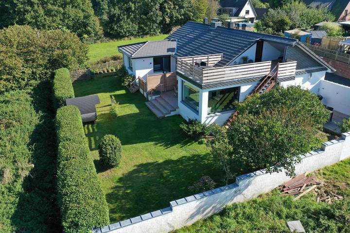 Ferienwohnung für 4 Personen, mit Terrasse und Garten sowie Sauna und Seeblick in Langballig