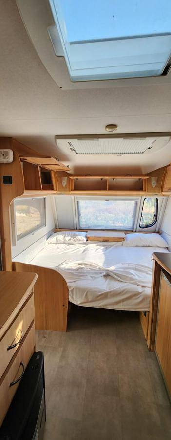 Camping pour 4 personnes, avec balcon ainsi que vue et jardin