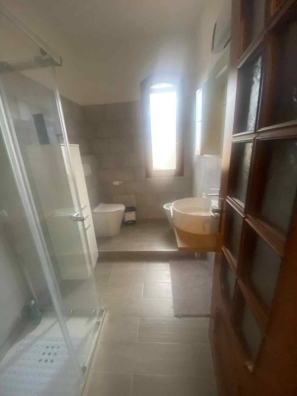 Entire apartment, Casa Liliana – Maddalena Spiaggia: Bright Holiday Home Steps from the Sea in Maddalena Spiaggia, Capoterra