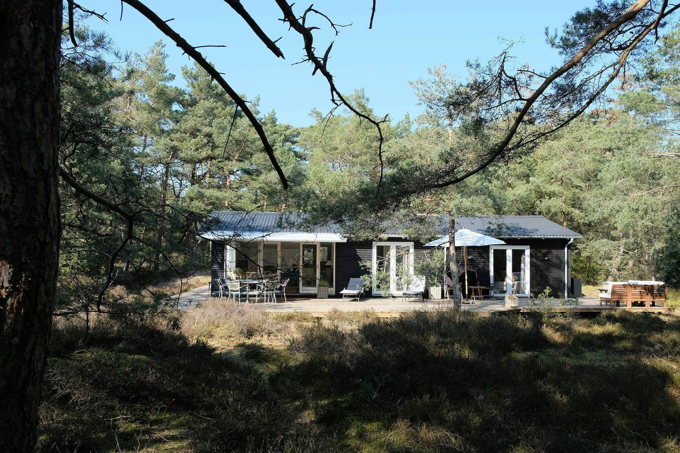 Ferienhaus mit freiem Blick auf den Wald in der Nähe von Nexø in Sommerodden, Dueodde