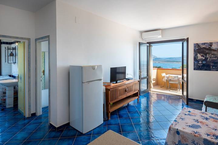 Holiday Home "Pergola 714" Steps from the Beach with Sea View and Balcony in Spiaggia La Pelosa, Stintino