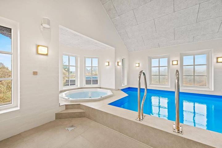 Impressive holiday home close to the beach with pool and games room in Blåvand in Blavand, Región de Varde