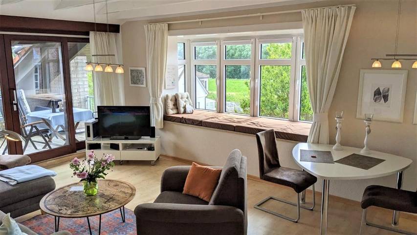 Ferienwohnung für 3 Personen, mit Balkon und Garten sowie Ausblick in Büsumer Deichhausen