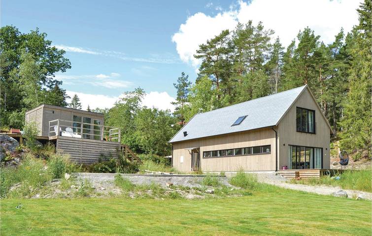 Ferienhaus für 5 Personen, mit Terrasse und Garten sowie Seeblick - 1