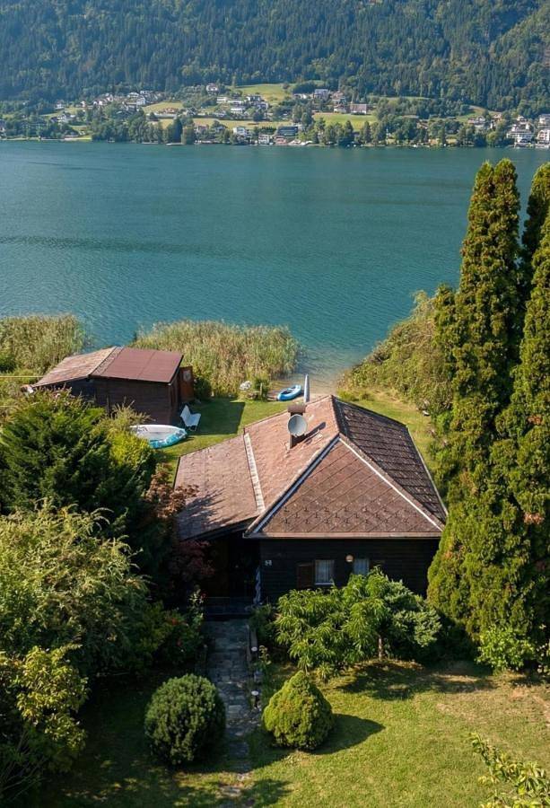 Ferienhaus für 6 Personen, mit Terrasse und Seeblick sowie Garten