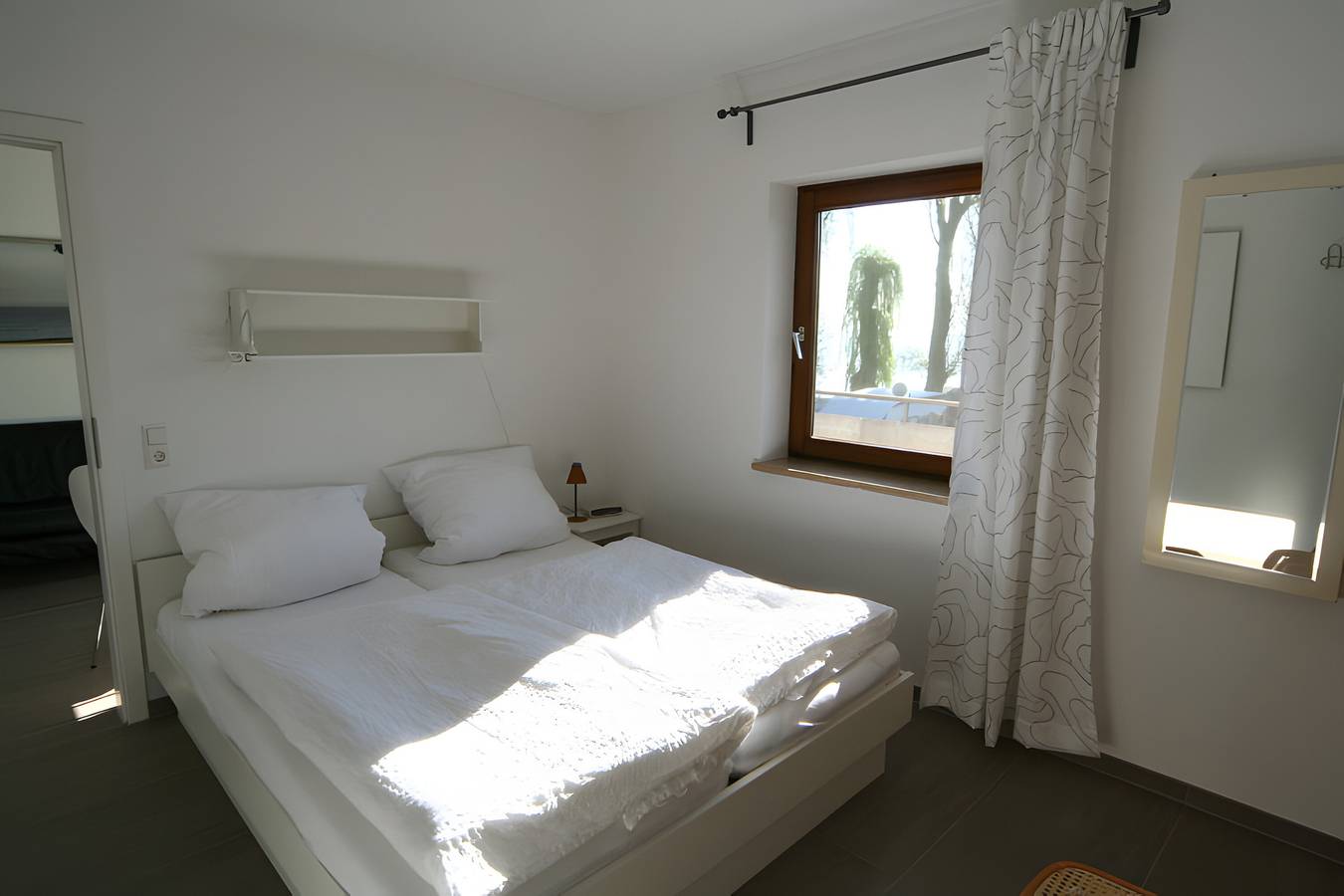 Ganze Wohnung, Apartment 'Sonnendeck mit Balkon' mit Seeblick, Gemeinschaftsterrasse und Wlan in Moos, Untersee