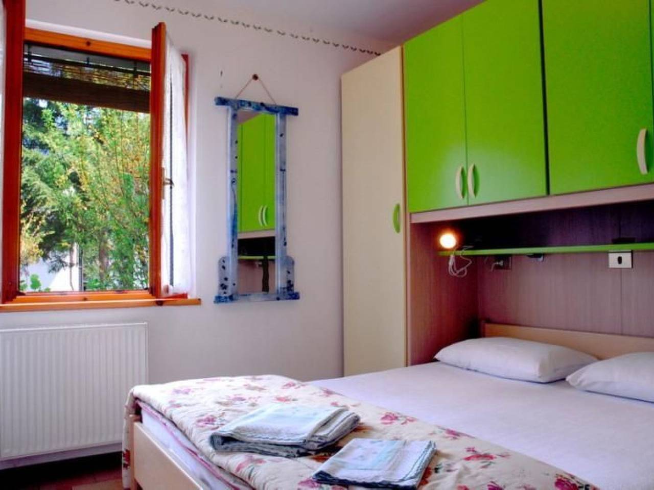 Erdgeschosswohnung mit möbliertem Garten, foto 12
