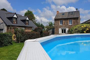 Gîte pour 10 personnes, avec jardin et piscine à Isigny-le-Buat
