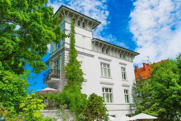 Ośrodek wypoczynkowy dla 24 osób, z ogród i sauna oraz widok w Morze Bałtyckie