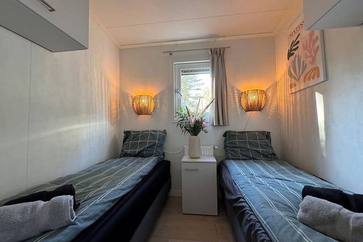 Ferienhaus mit Waldblick und privatem Jacuzzi in Veluwe
