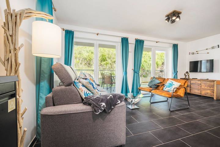 Ferienwohnung für 6 Personen, mit Terrasse und Sauna in Schillig