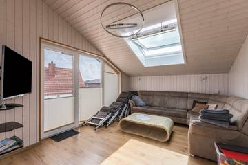 Ferienhaus "Manni Dg" mit privater Sauna, WLAN, Garten und Balkon