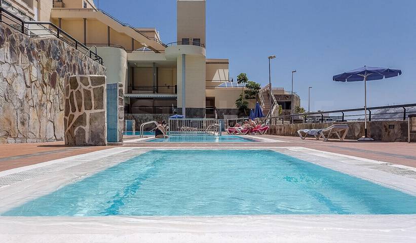 Vakantieappartement voor 4 personen, with Balkon and Terras as well as Zwembad in Puerto Rico (Gran Canaria)