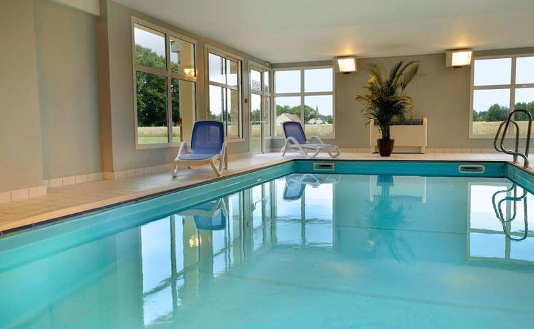 Appartement de vacances pour 4 personnes, avec Balcon et Jardin ainsi que Piscine et Sauna