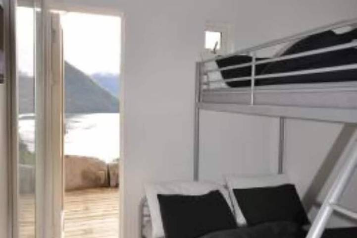 Ferienhaus in der Mitte einer wunderschönen und dramatischen Landschaft in Ørsta