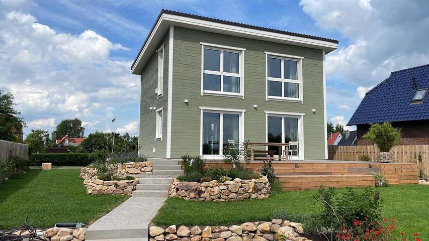 Ferienhaus mit Meerblick für 5 Personen, mit Terrasse und Garten sowie Seeblick und Ausblick in Südbrookmerland