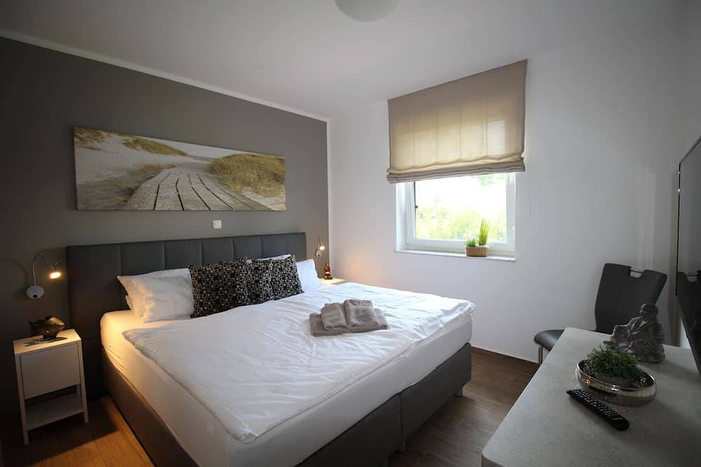 Haus Seeblick Comfort mit Kamin, Außen-Whirlpool, Sauna und eingezäunten Garten in Göhren-Lebbin, Fleesensee