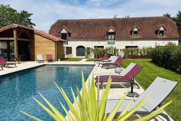 Location de vacances pour 4 personnes, avec piscine ainsi que jardin et sauna à Saint-Sozy