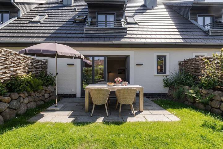 Ferienwohnung für 3 Personen, mit Terrasse und Garten sowie Sauna in Tinnum