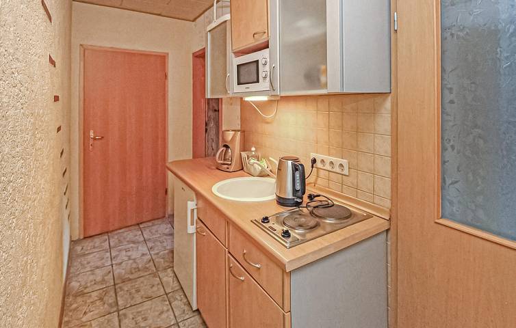 Ganze Ferienwohnung, Gemütliches Apartment 1,5 km vom Strand entfernt mit Parkplatz und Küche in Mühl Rosin, Mecklenburgische Seenplatte