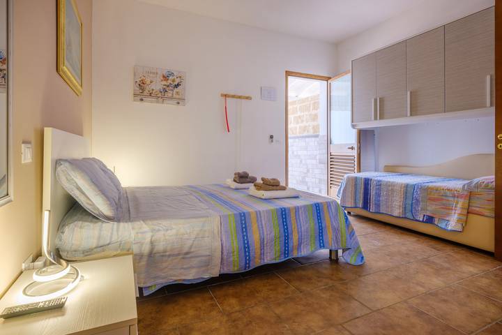 Monolocale intero, Appartamento 'Mamba House 3' con terrazza privata, giardino in comune e aria condizionata in Borgagne, Melendugno