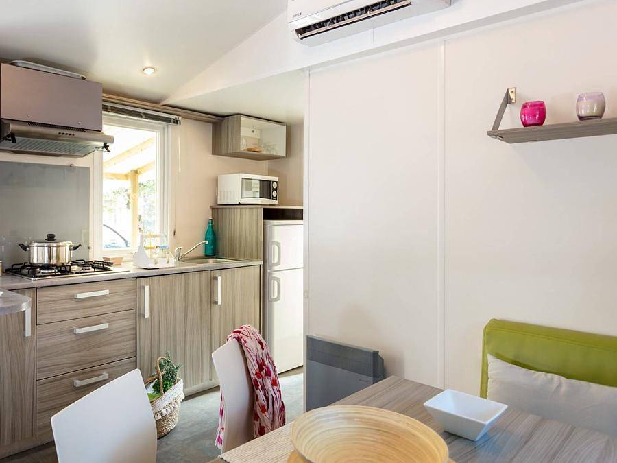 Camping Le Trivoly - Mobilhome 6 personnes - Mobil-home | Comfort | 2 Ch. | 4/6 Pers. | Terrasse surélevée | Clim. in Torreilles, Côte d'Améthyste