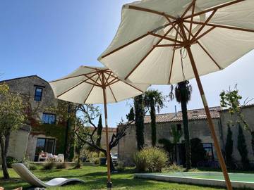 Location de vacances pour 17 personnes, avec jardin ainsi que vue et piscine dans Saint-Gervais (Gironde)