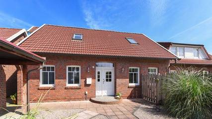 Ferienwohnung für 4 Personen, mit Garten, kinderfreundlich in Neugarmssiel