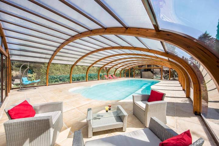 Maison de vacances pour 4 personnes, avec Balcon et Terrasse ainsi que Jardin et Piscine