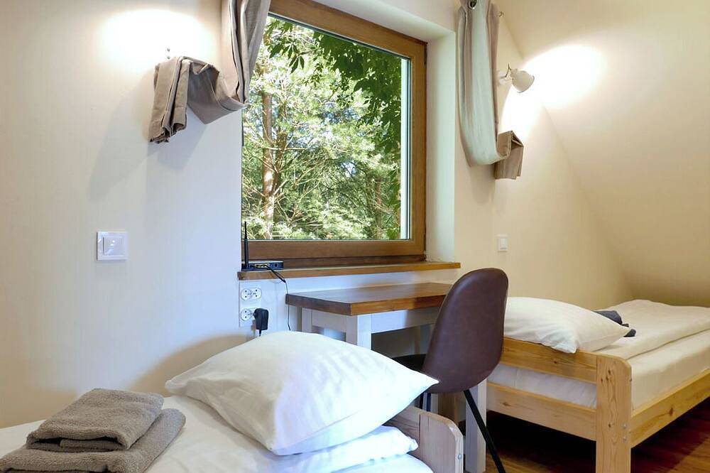 Ferienhaus in einem Pinienwald, Ruhe, Sauna, Pferde in Krokowa