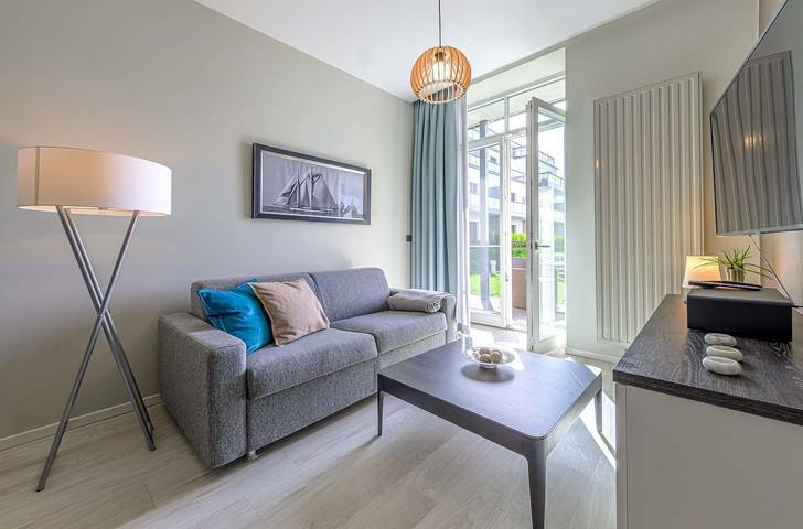 Ferienwohnung für 3 Personen, mit Terrasse und Seeblick sowie Sauna in Wustrow