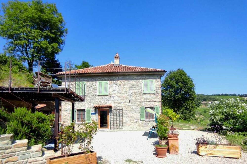 Stone house with swimming pool with whirlpool and patio with terrace on the valley in Mango , Langhe